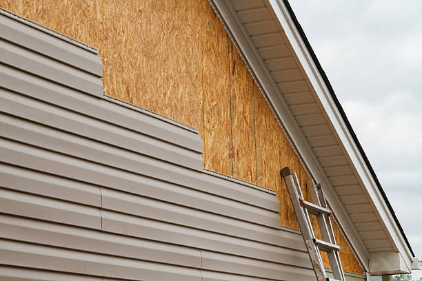 Professional Emergency Siding Repair technician working in Baldwin, GA